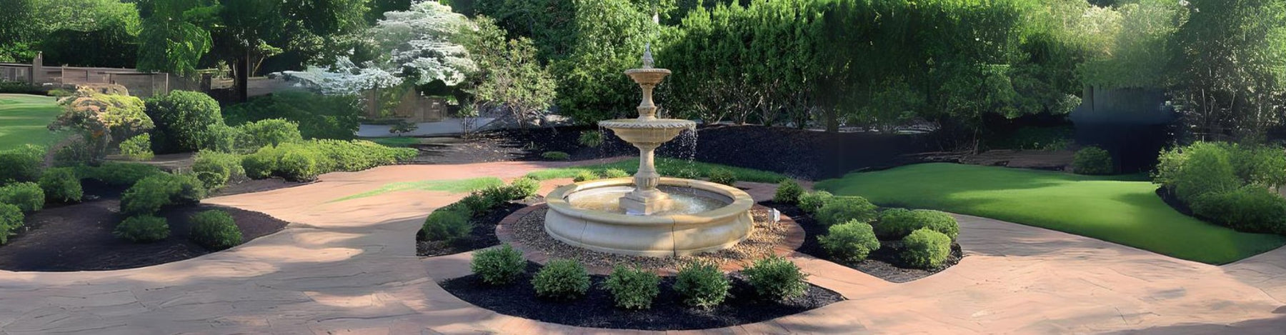 Charleston Fountain in basin on mixed pebbles in backyard