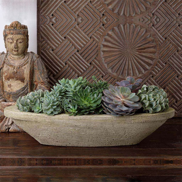 Barca Planter, Small on table filled with plants
