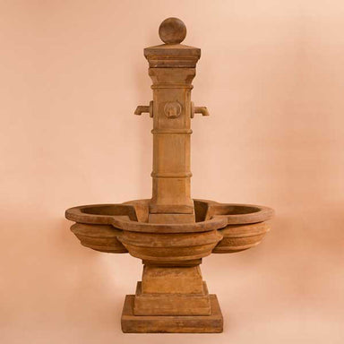 Grand Avignon Courtyard Fountain against brown background.