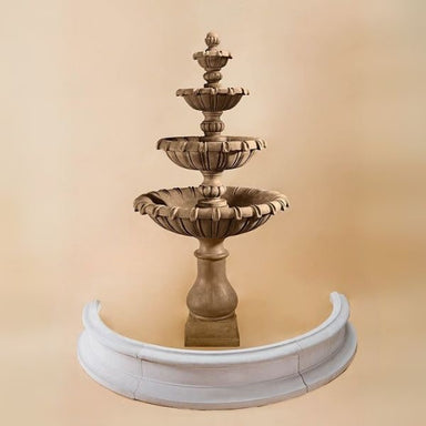 Grand Chateau Four Tier Fountain for Pond against brown background.