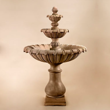 Grand Chateau Three Tier Fountain against brown background.