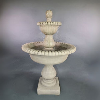 Malibu Two Tier Fountain against gray background.