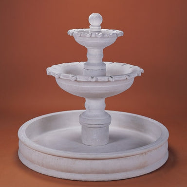 Marina Pond Fountain against brown background.