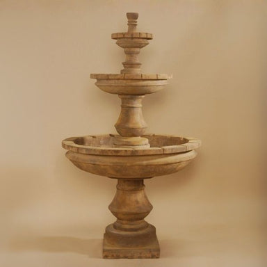 Montefalco Three Tier Fountain against brown background.