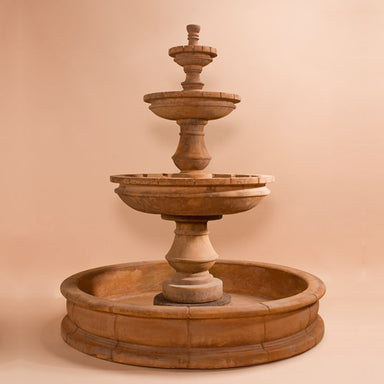 Montefalco Three Tier Pond Fountain against brown background.