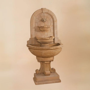 Montefalco Wall Fountain against brown background.