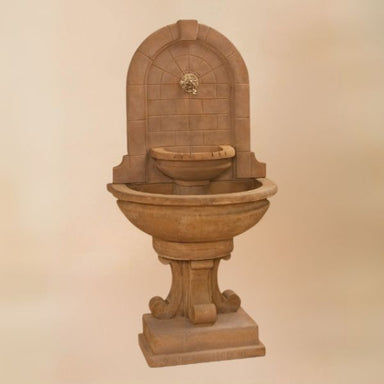 Montefalco Wall Fountain for Bronze Spout against brown background.