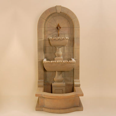 Monterosso Wall Fountain with Pond against brown background.