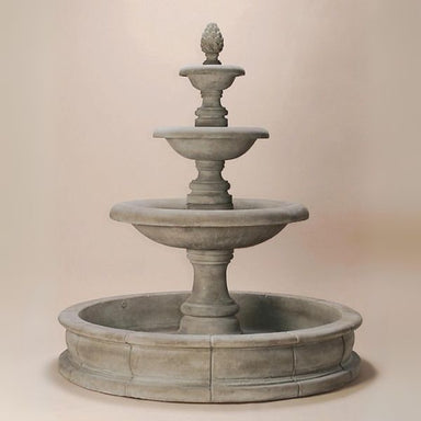 Newcastle Three Tier Pond Fountain against brown background.