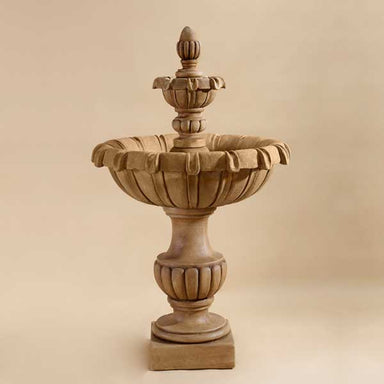 Petite Chateau Two Tier Fountain against brown background.