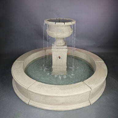 Piazza Aventino Easy Pond Fountain with copper spouts against gray background.