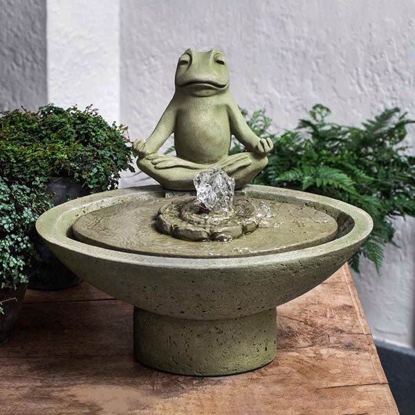 Garden Terrace Meditation Fountain on table beside green plants