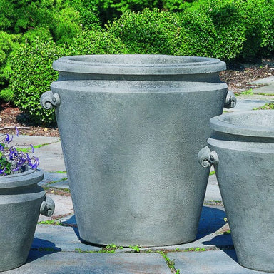 Scroll Handle Large Planter on stone against green plants