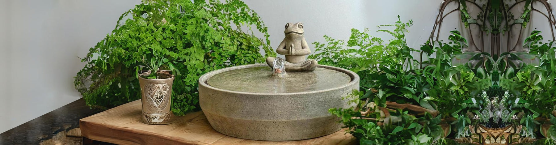 Beveled Yoga Frog Fountain in alpine stone in action featured image