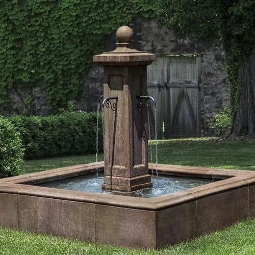 Luberon Estate Fountain in aged limestone in the backyard featured image