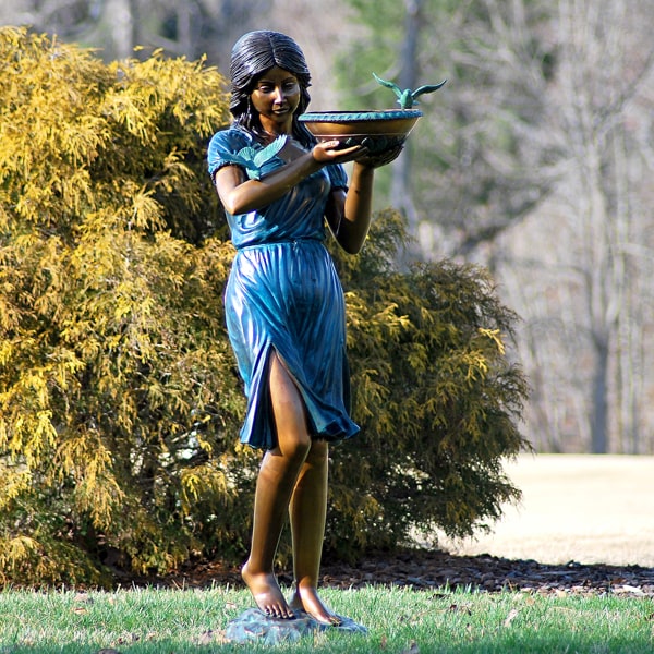 Bronze Girl with Birdbath Fountain Sculpture in the backyard