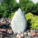 18 inch Green Marble Almond Fountain Kit on mix pebbles in the backyard