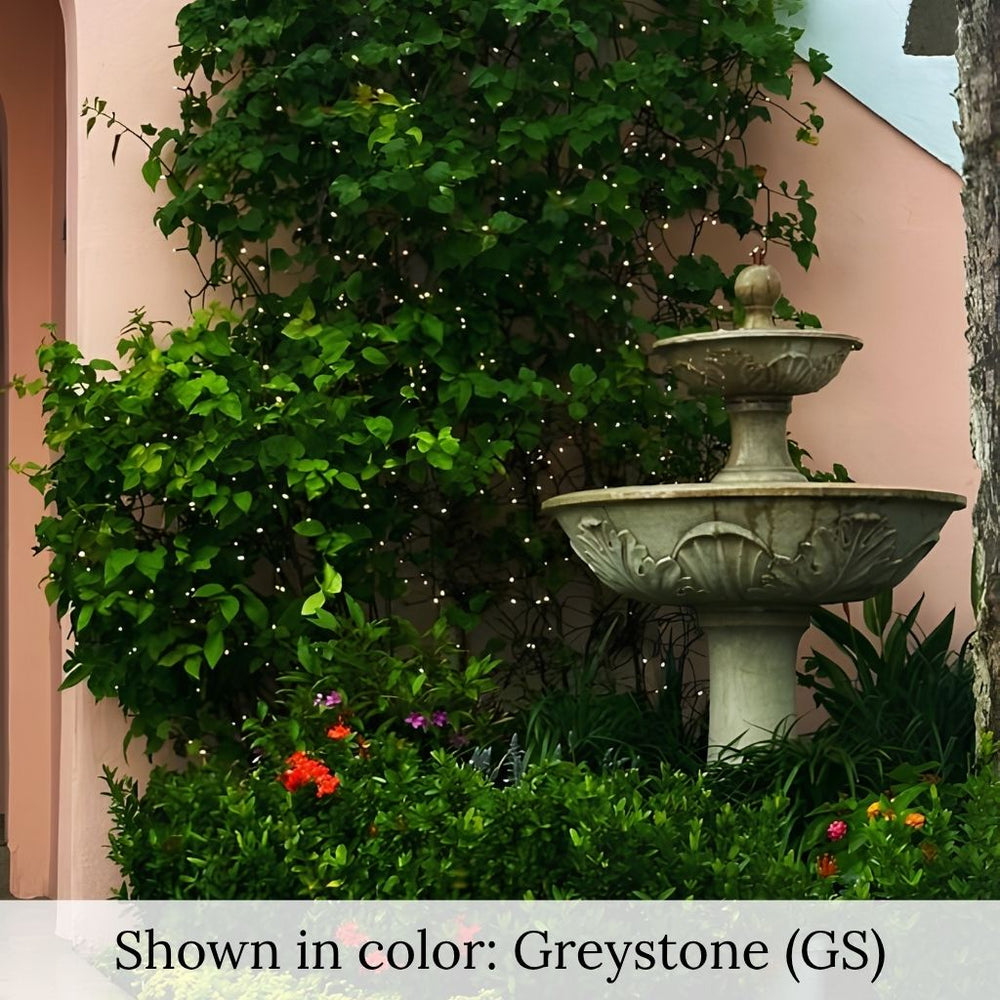 Acanthus Two Tiered fountain in action surrounded with plants