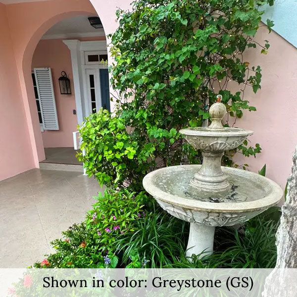 Acanthus Two Tiered Fountain surrounded with plants