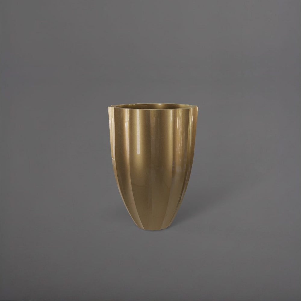 Alicante Tapered Fluted Round Fiberglass Planter in gloss metallic gold against gray background.