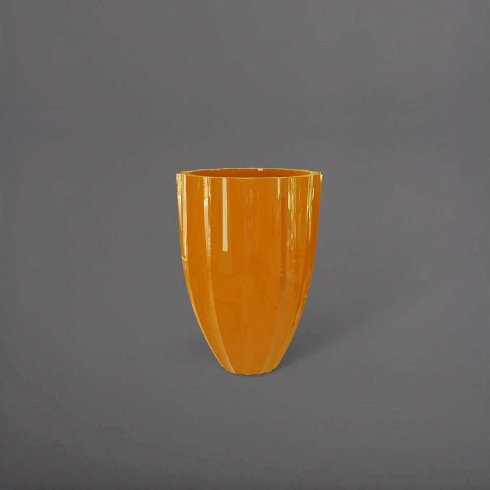 Alicante Tapered Fluted Round Fiberglass Planter in gloss tangerine against gray background.