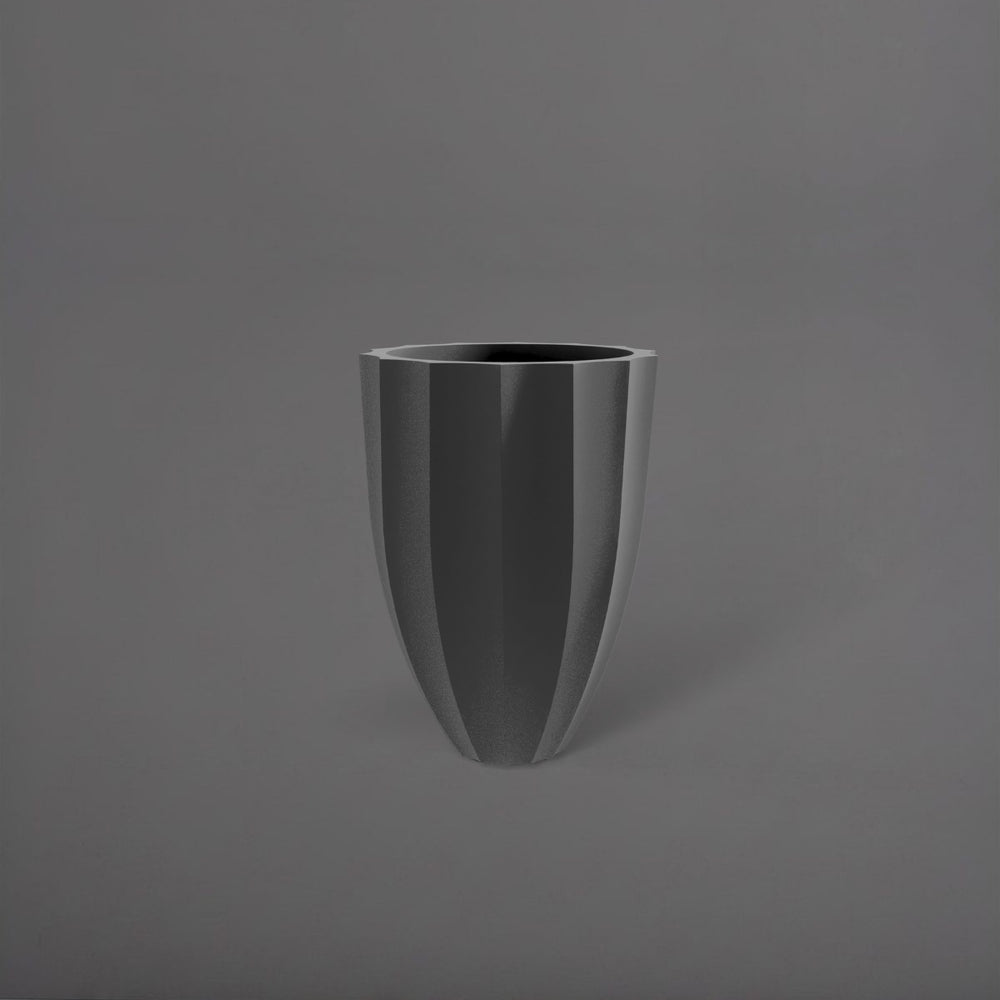 Alicante Tapered Fluted Round Fiberglass Planter in matte gunmetal against gray background.