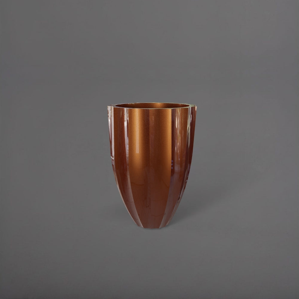 Alicante Tapered Fluted Round Fiberglass Planter in metallic bronze against gray background.