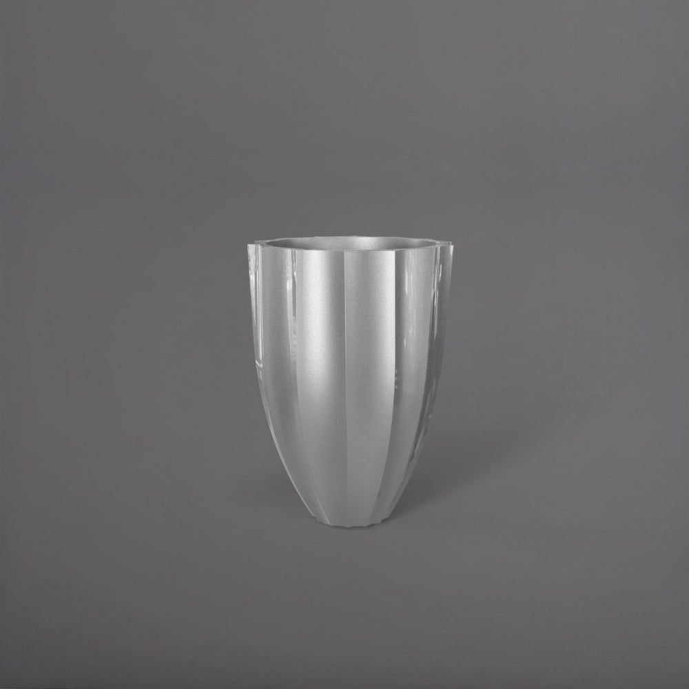 Alicante Tapered Fluted Round Fiberglass Planter in metallic silver against gray background.