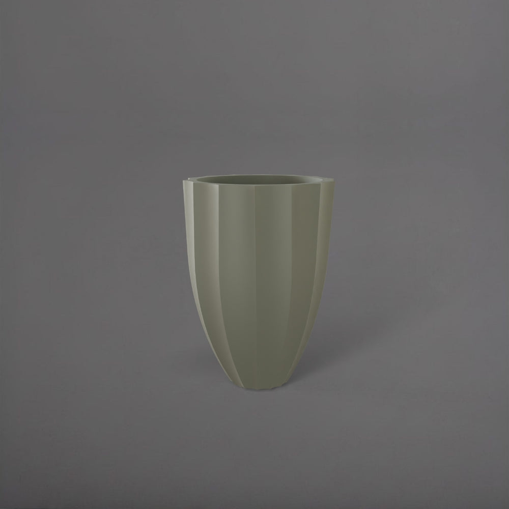 Alicante Tapered Fluted Round Fiberglass Planter in satin beige against gray background.