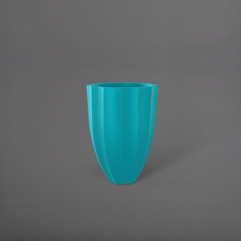 Alicante Tapered Fluted Round Fiberglass Planter in satin seafoam green against gray background.