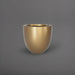 Alzira Round Fiberglass Planter in gloss metallic gold against gray background.