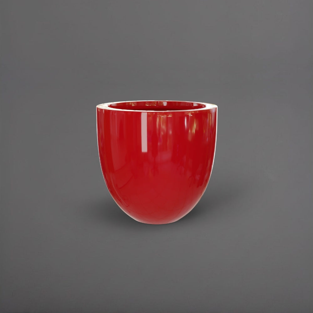 Alzira Round Fiberglass Planter in gloss red against gray background.