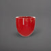 Alzira Round Fiberglass Planter in gloss red against gray background.