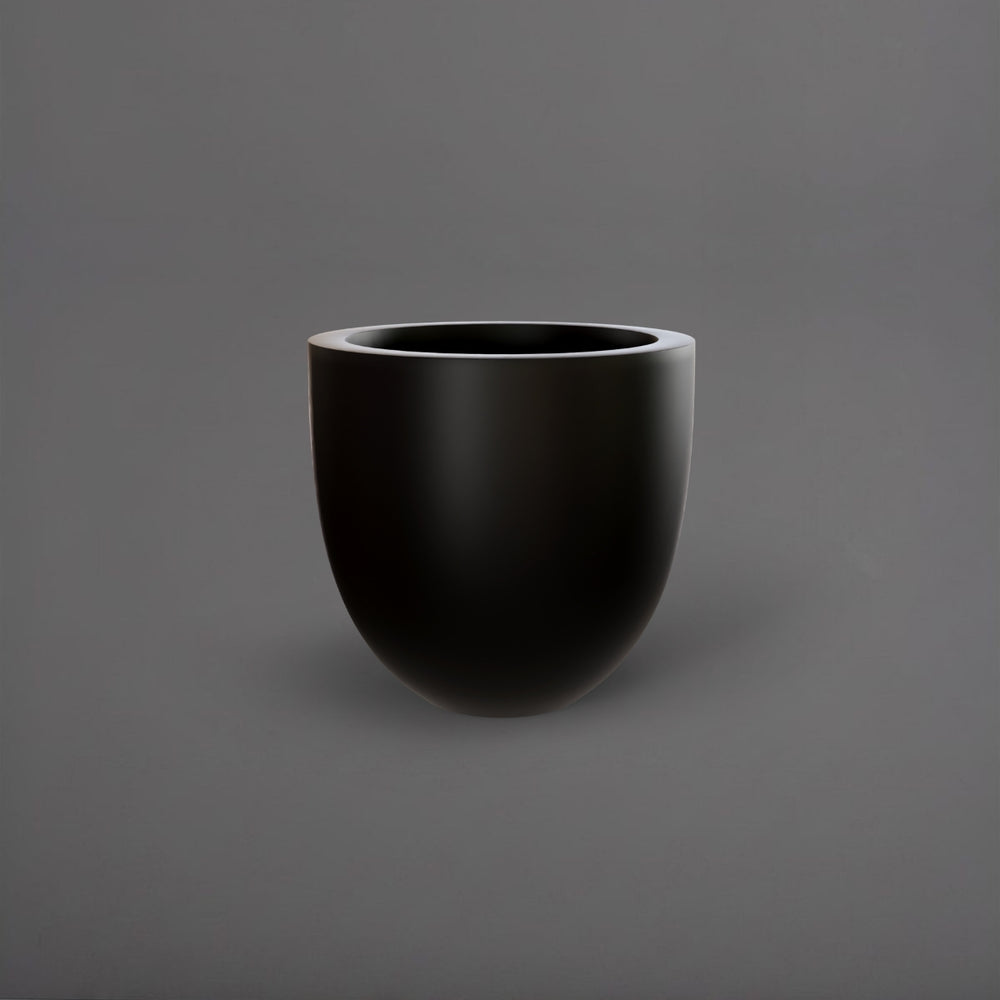 Alzira Round Fiberglass Planter in matte black against gray background.