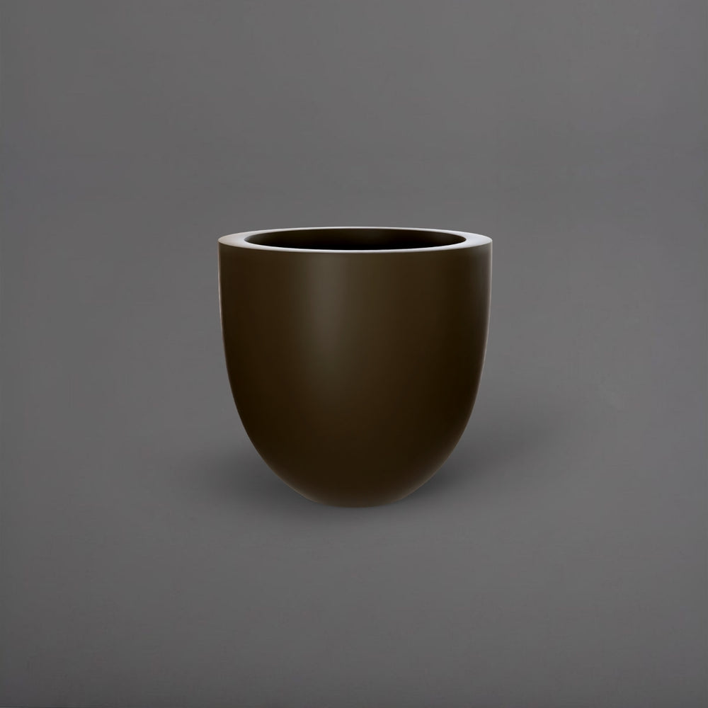 Alzira Round Fiberglass Planter in matte bronze against gray background.