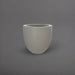 Alzira Round Fiberglass Planter in matte cement grey against gray background.