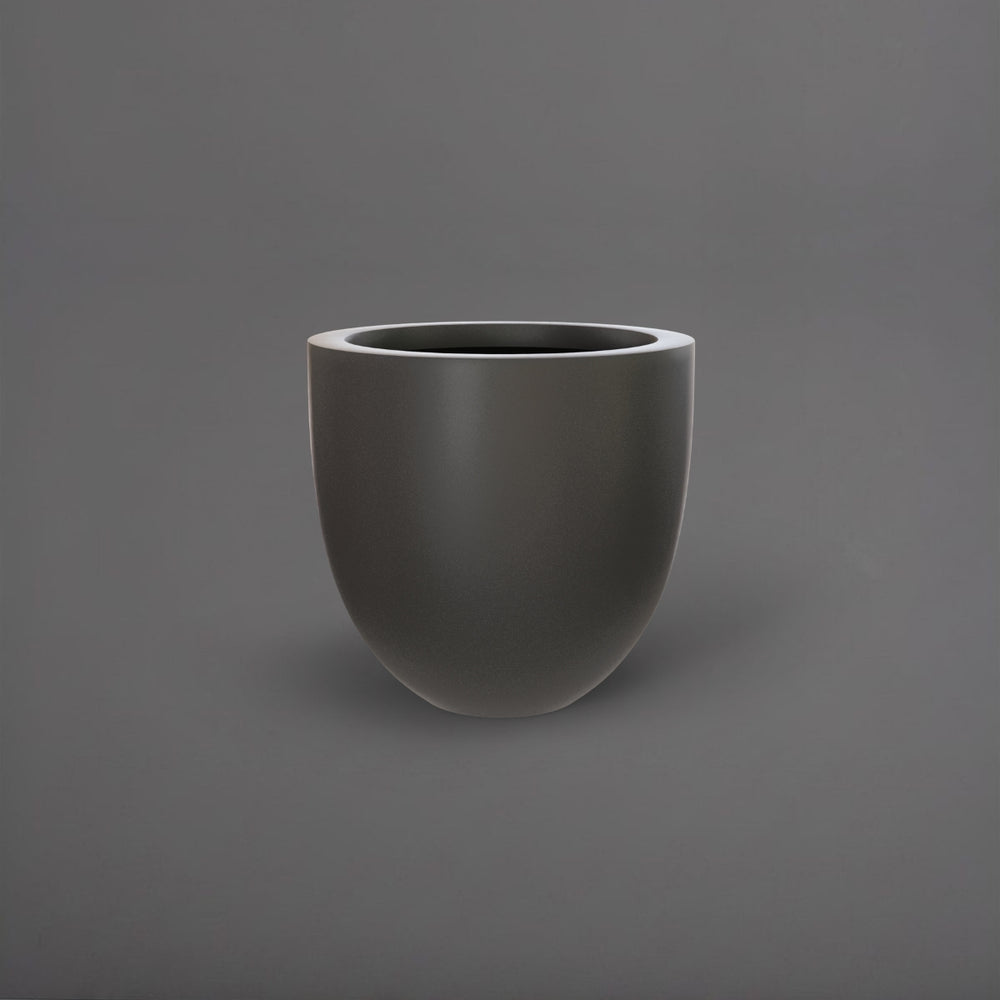 Alzira Round Fiberglass Planter in matte gunmetal against gray background.