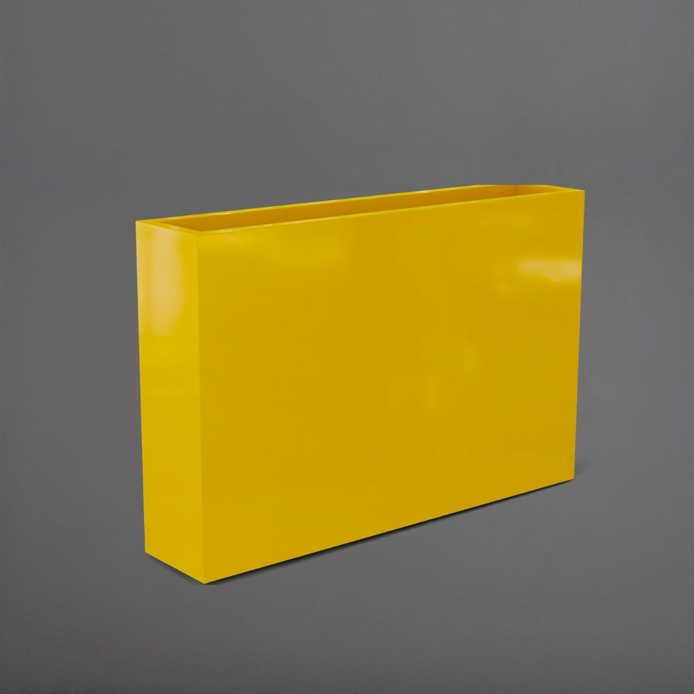 Amesbury Narrow Rectangle Planter in gloss saffron against gray background.