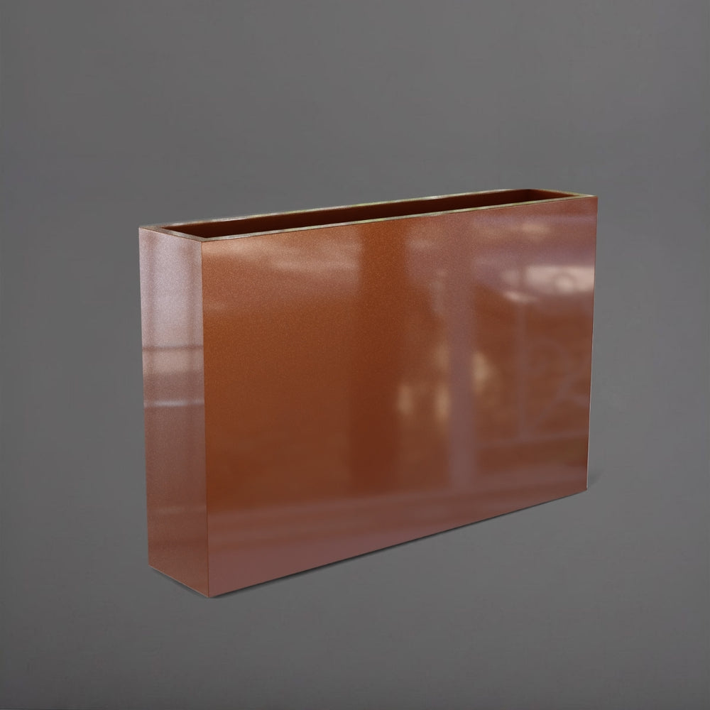 Amesbury Narrow Rectangle Planter in metallic bronze against gray background.