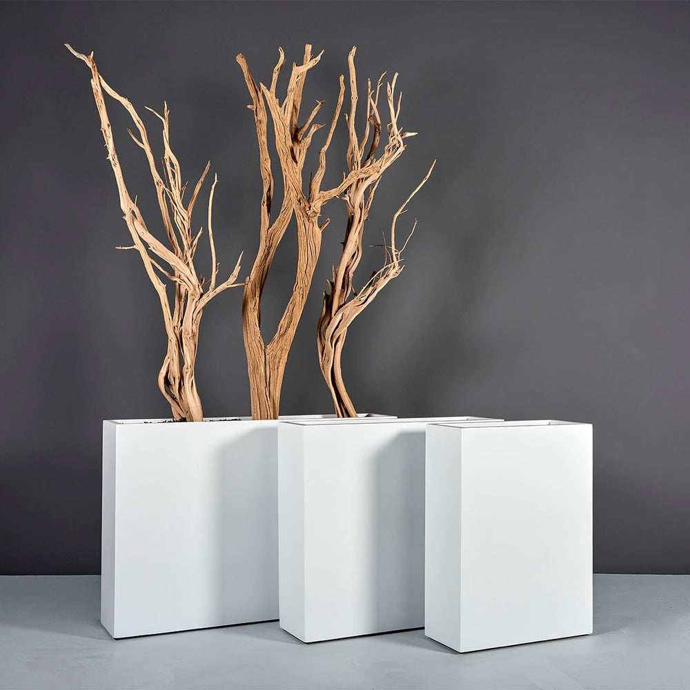 Amesbury Narrow Rectangle Planter shown in different sizes filled with plants.