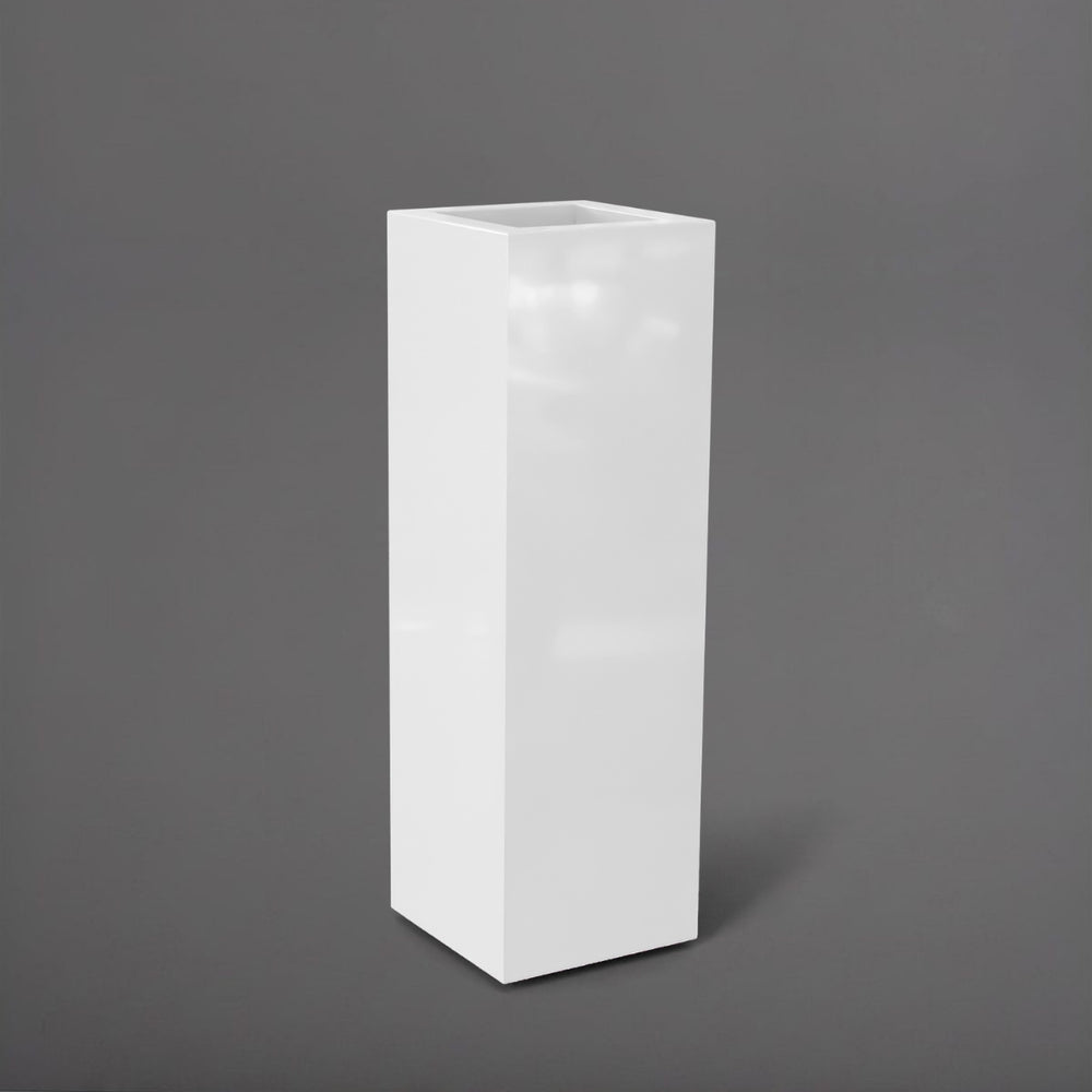 Amesbury Tall Corner Planter in gloss bright white against gray background.