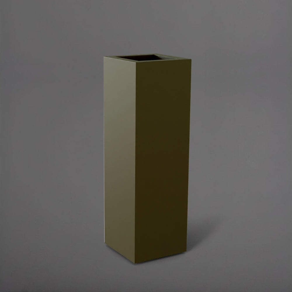 Amesbury Tall Corner Planter in matte bronze against gray background.