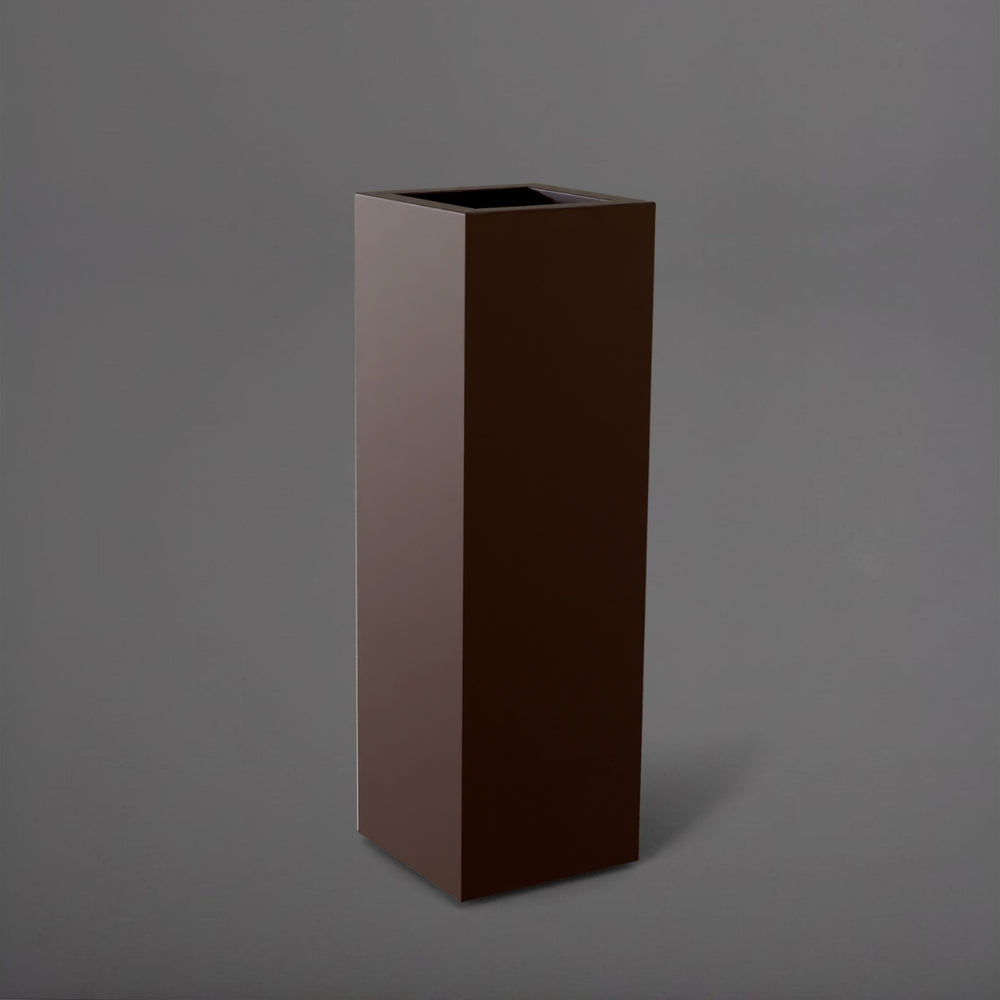 Amesbury Tall Corner Planter in matte dark brown against gray background.