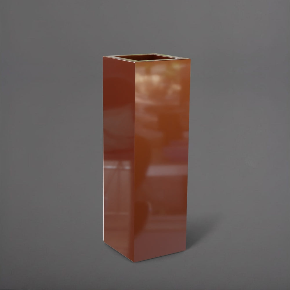 Amesbury Tall Corner Planter in metallic bronze against gray background.