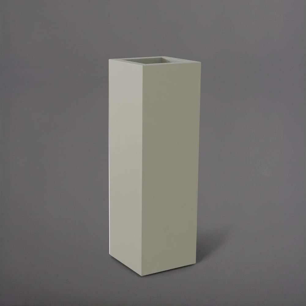 Amesbury Tall Corner Planter in satin beige against gray background.