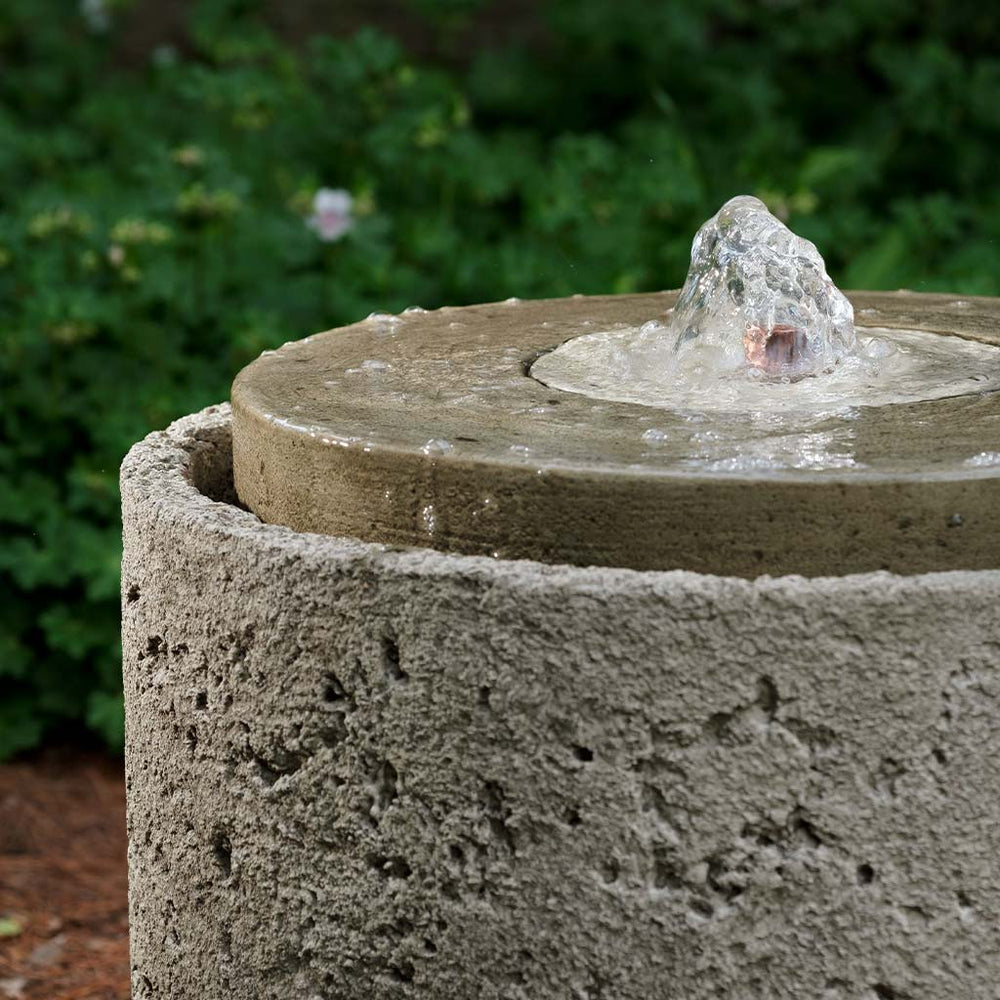 Andros Fountain on ground in the backyard upclose
