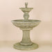 Antiquarium Two Tier Fountain against brown background.