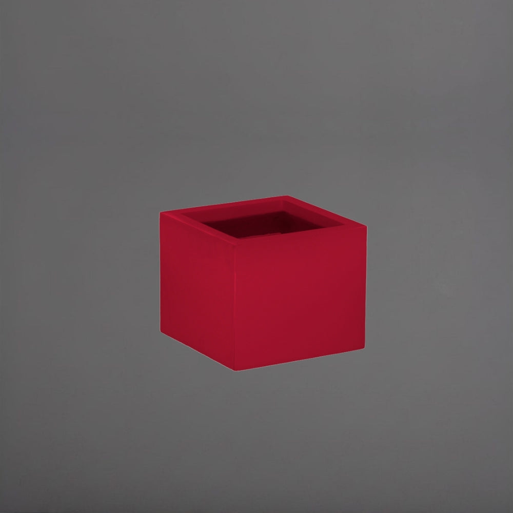 Antwerp Corner Fiberglass Planter in gloss red against gray background.