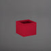 Antwerp Corner Fiberglass Planter in gloss red against gray background.