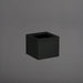 Antwerp Corner Fiberglass Planter in matte black against gray background.